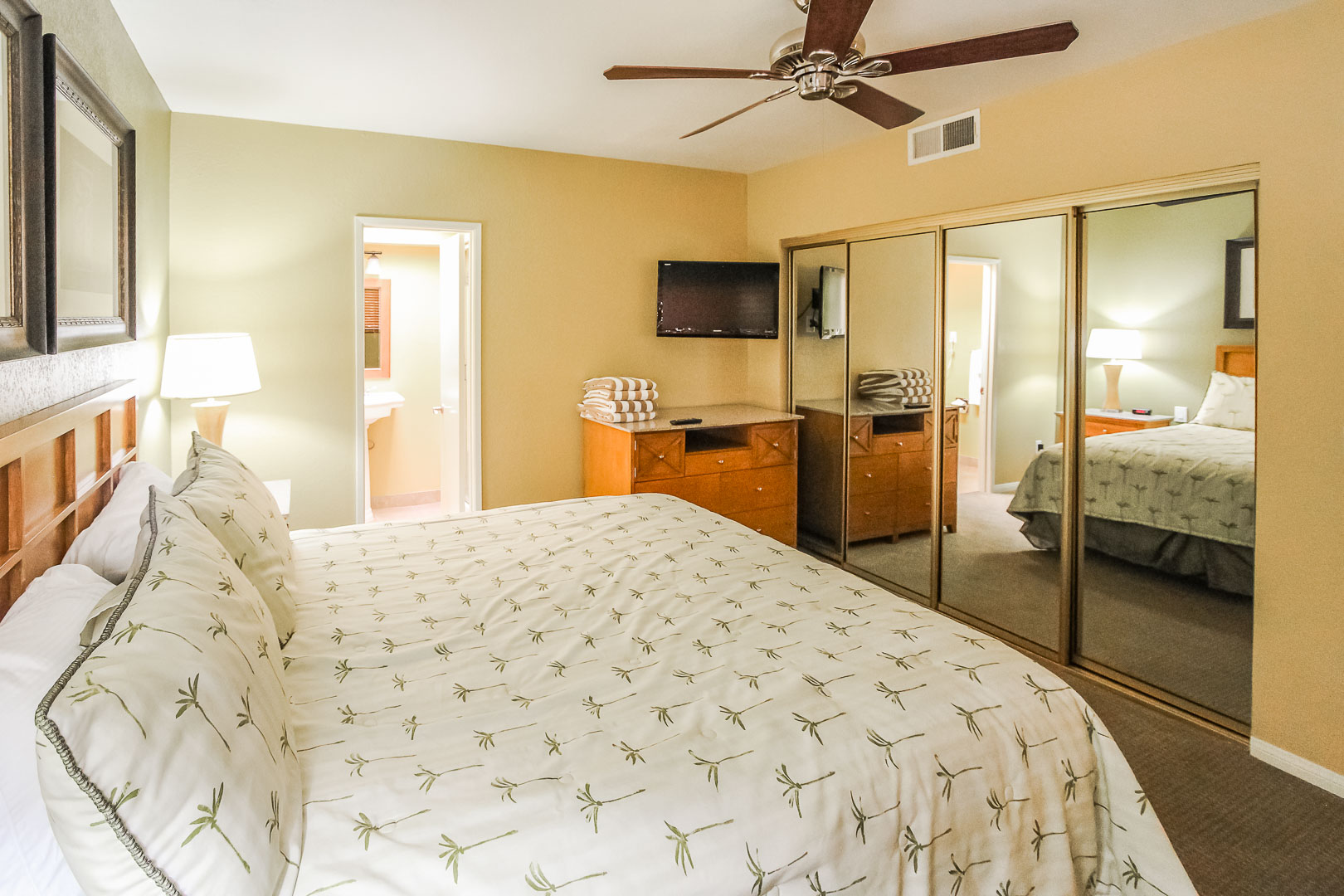 A cozy master bedroom at VRI's Desert Isle Resort in California.